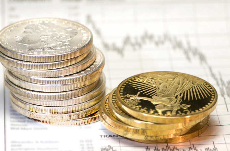 stack of fine gold and silver coins